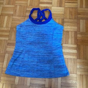Lululemon blue athletic top with built in unpadded bra. Size 12. Strap detail.